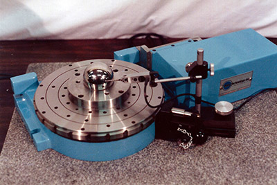 A rotary grinding table performing an inspection application